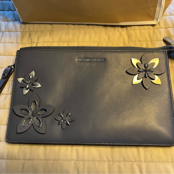 Authentic Michael lots clutch never used. Blue grey in color. - Picture 2 of 2